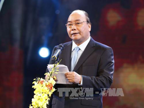 Thủ tướng Chính phủ Nguyễn Xuân Phúc phát biểu tại Chương trình “Bảo hiểm y tế toàn dân - Chung tay vì sức khỏe cộng đồng